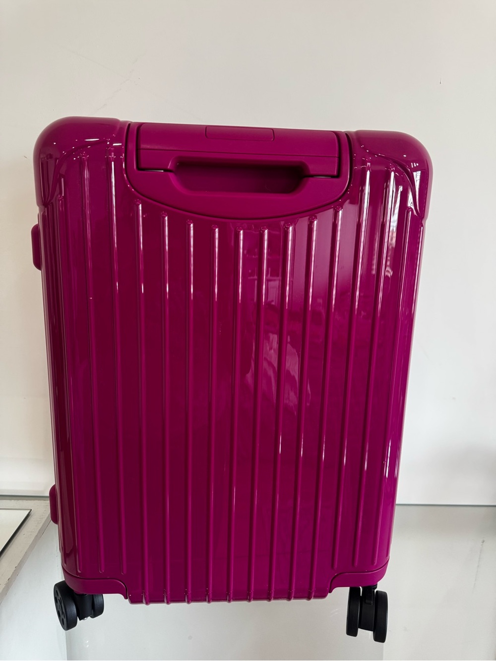 RIMOWA Fuchsia Hard Shell Carry-On with Built-In Lock